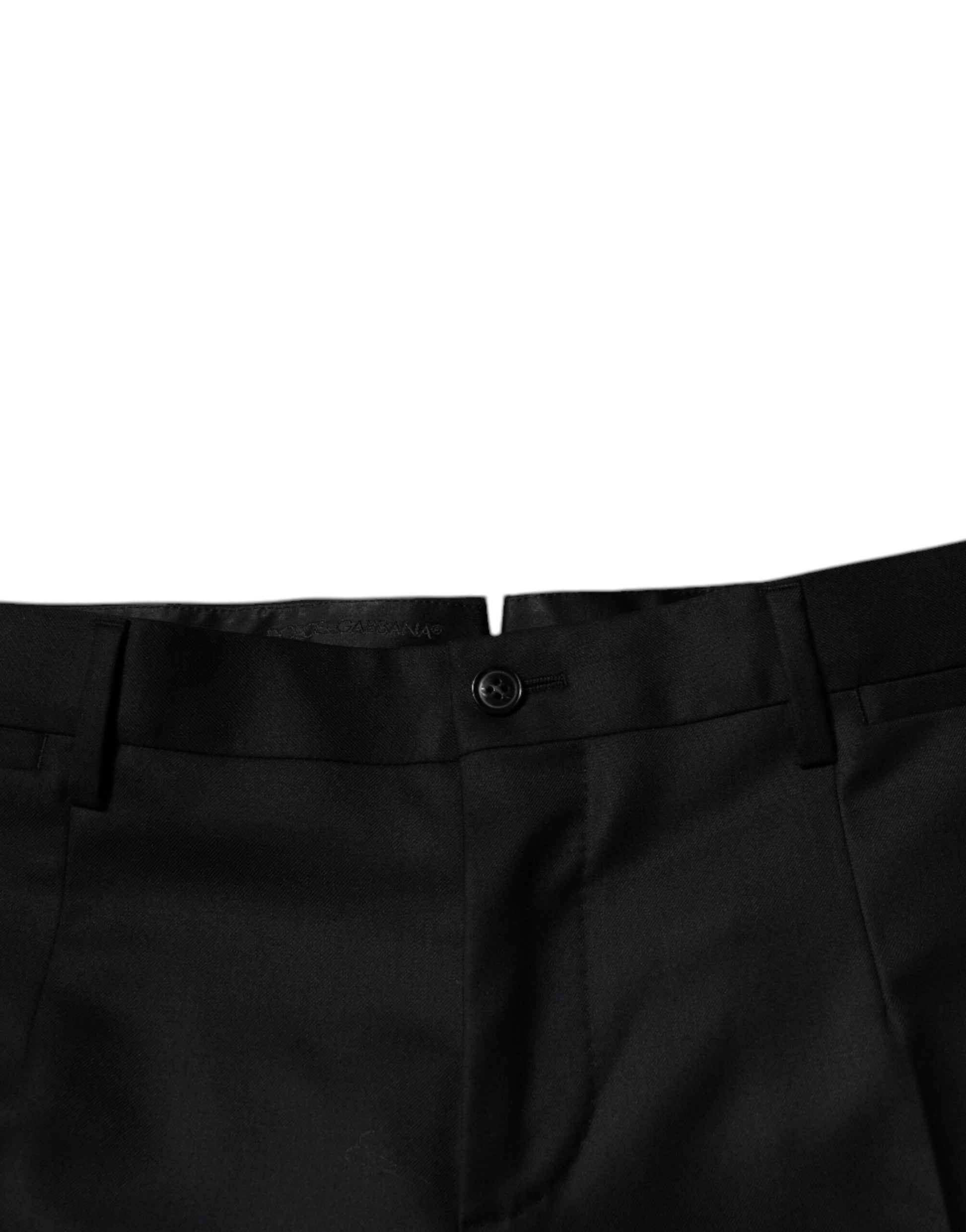 Pair of black trousers with a buttoned front