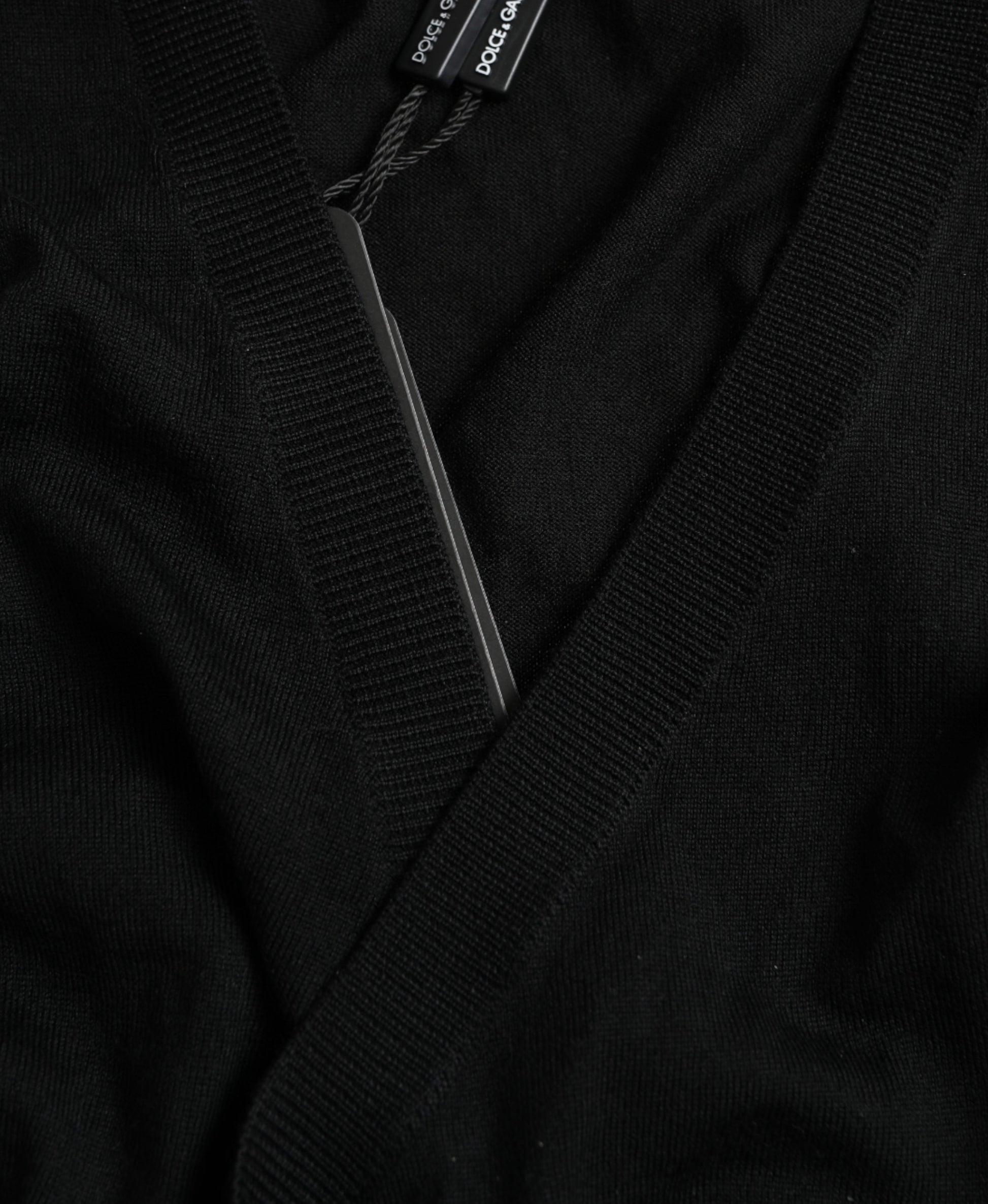 Black zip up cardigan on hanger