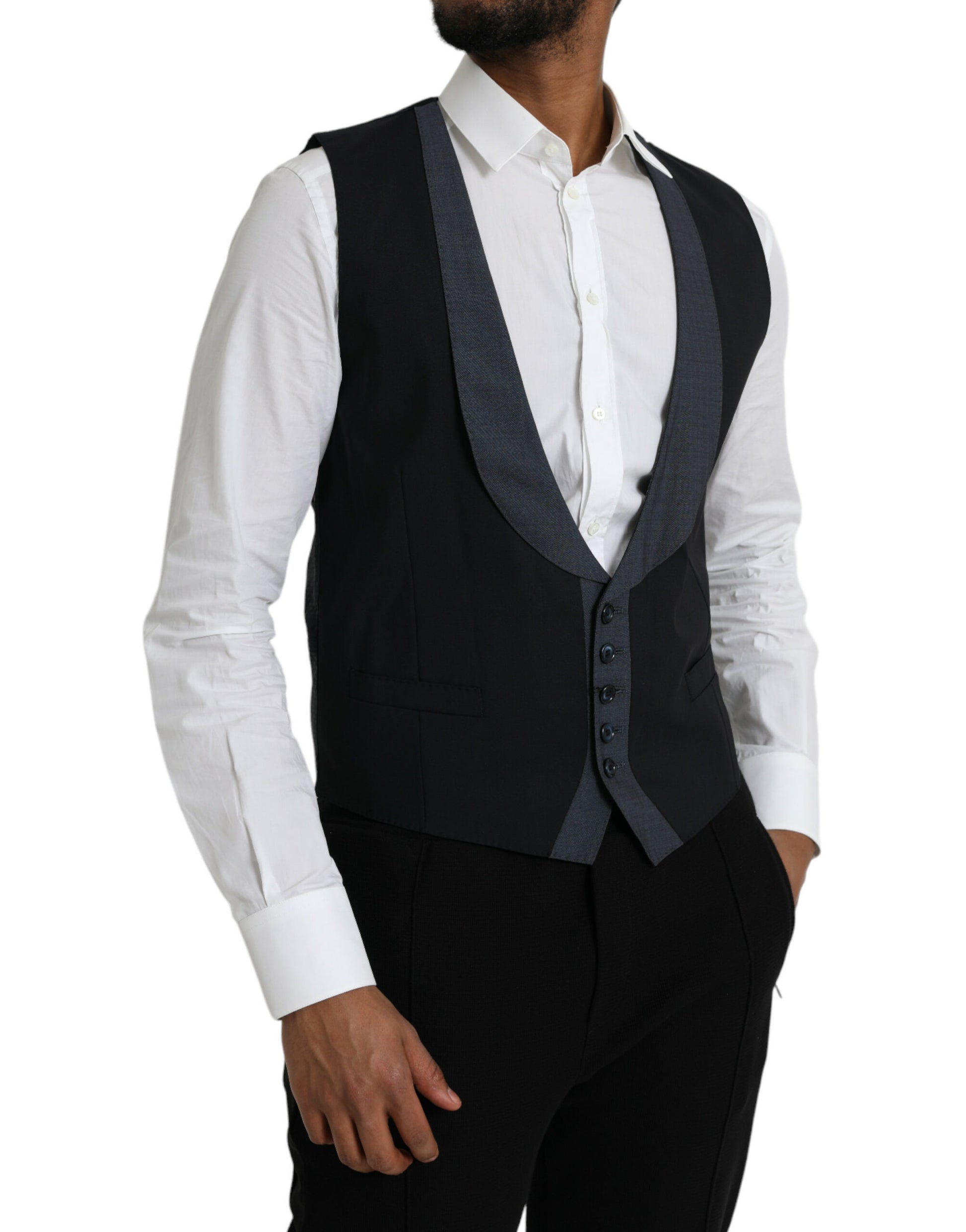A black wool vest with a lapel and two pockets, part of formal wear