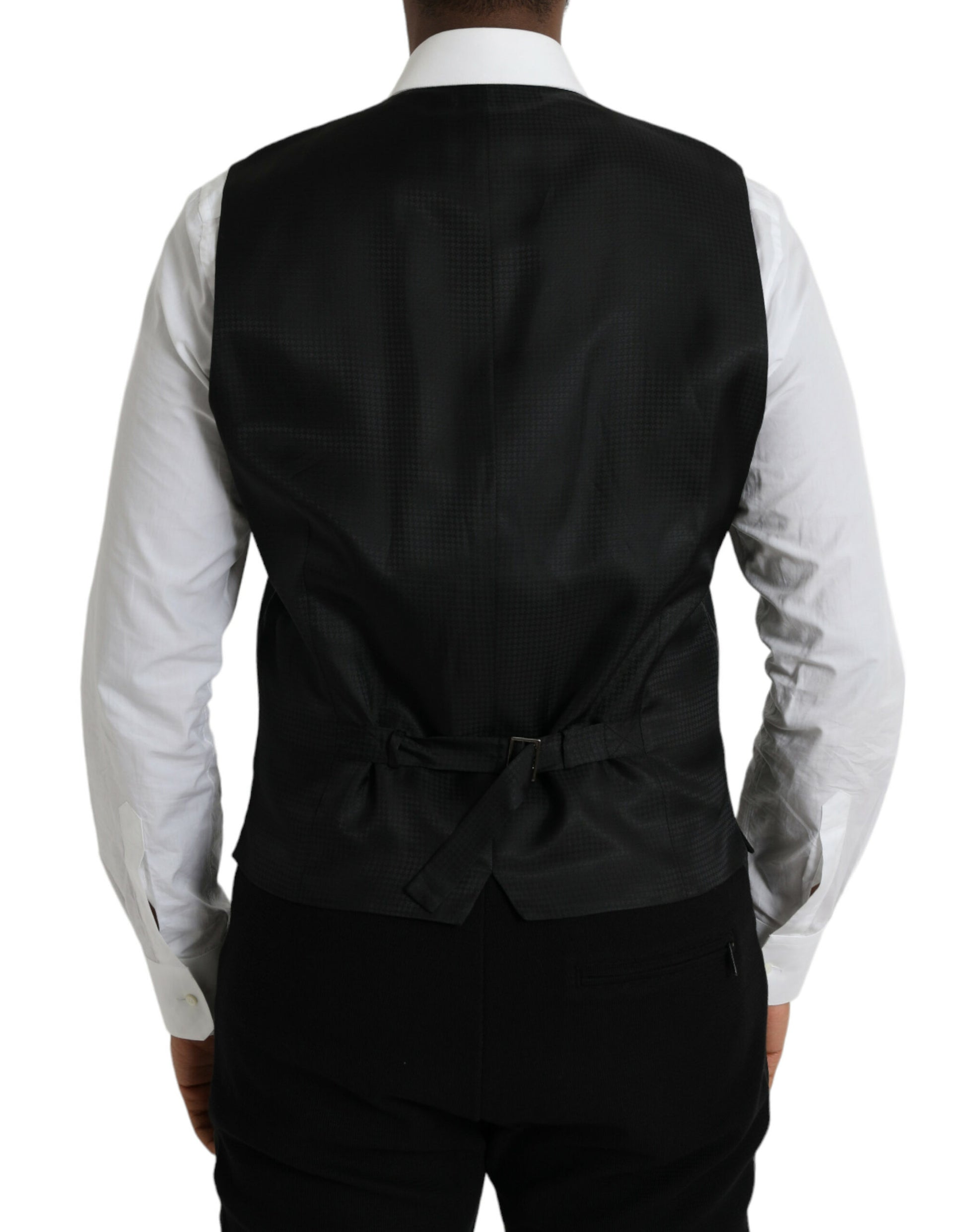 A black wool vest with a bow tie, part of a formal dress suit