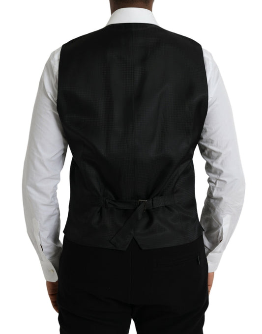 A black wool vest with a bow tie, part of a formal dress suit
