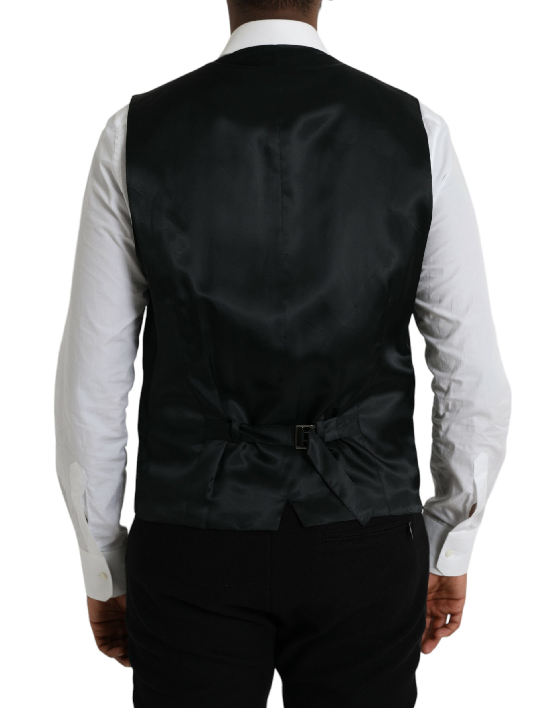 A black wool waistcoat with a satin lapel, designed by Dolce & Gabbana. It is part of the formal dress collec