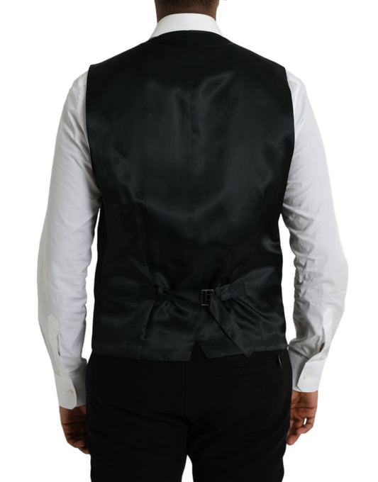 A black wool waistcoat with a satin lapel, designed by Dolce & Gabbana. It is part of the formal dress collec