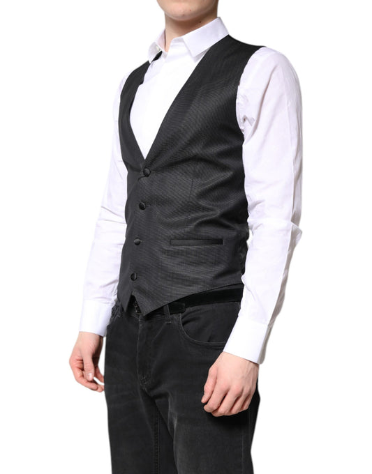 A black wool vest from Dolce & Gabbana, part of a formal dress suit