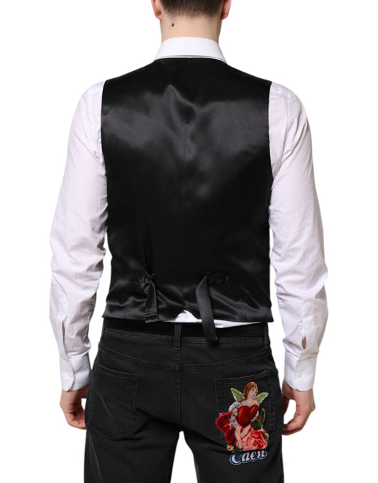 A black wool vest with a rose embroidered on the back