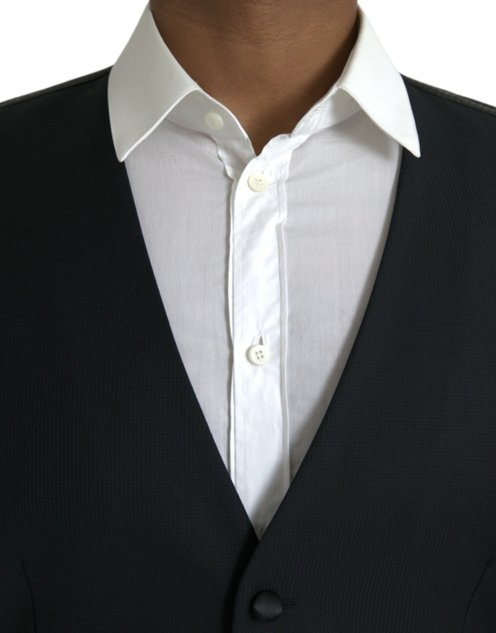 A black wool waistcoat with a white shirt underneath
