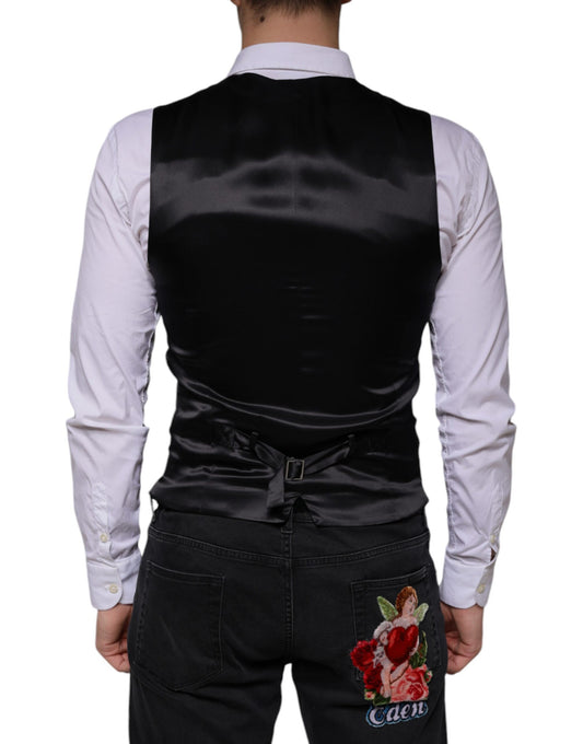 A black wool vest with a lapel and a floral embroidery on the back