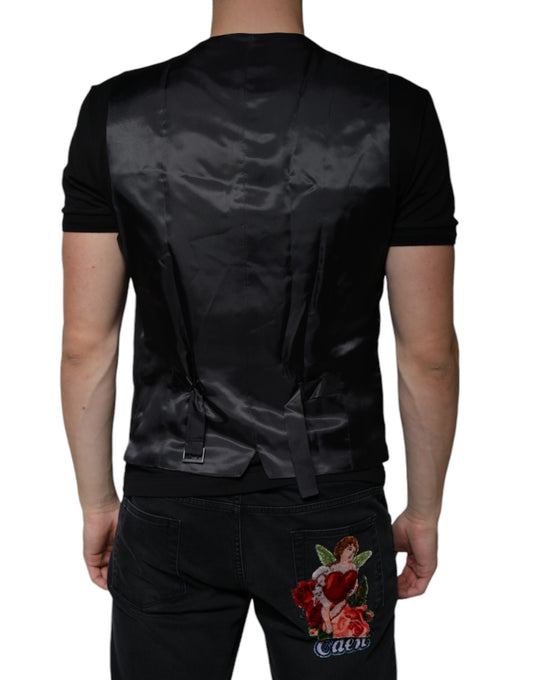 A black wool vest with a lapel and a floral embroidered patch on the back