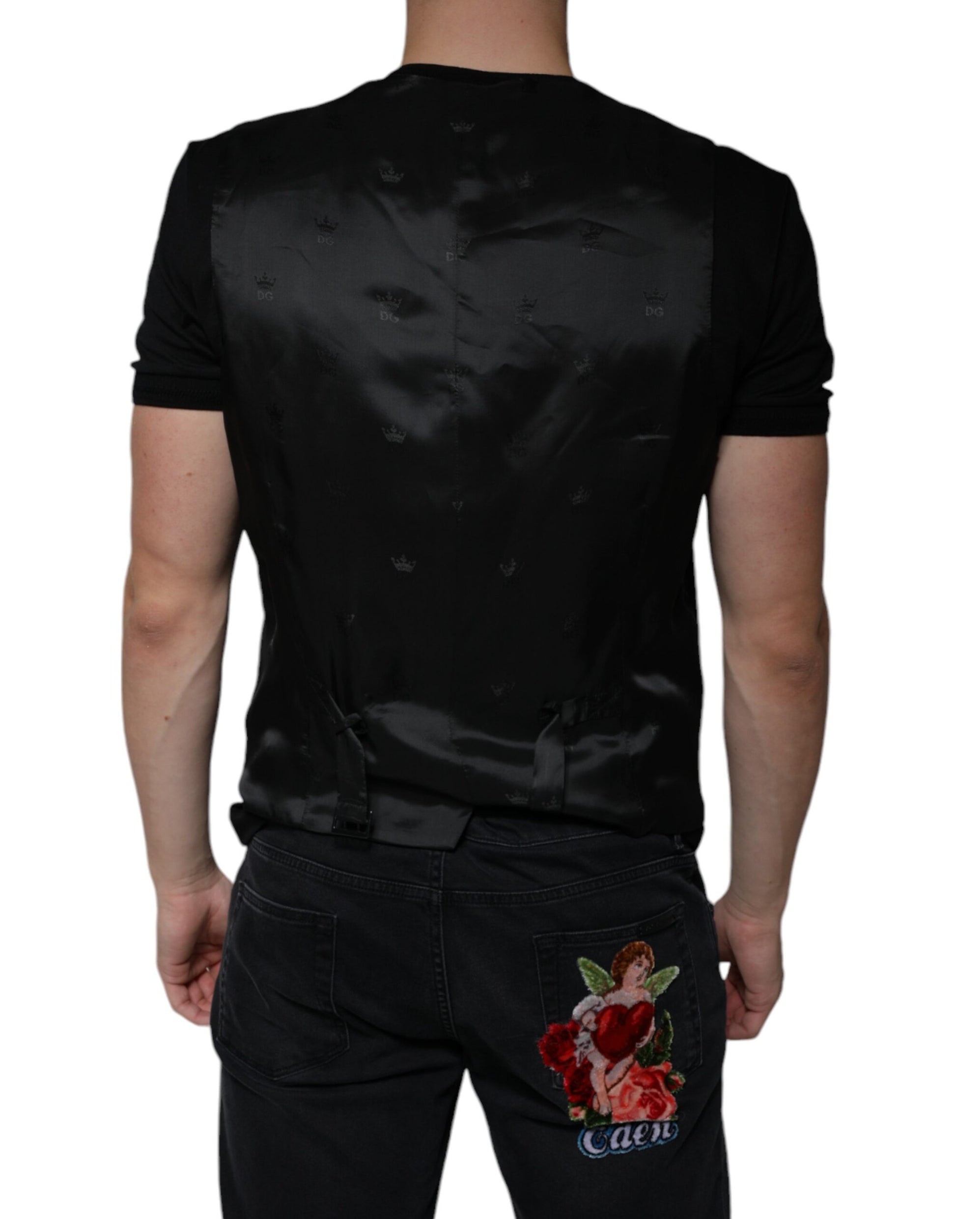 A black wool waistcoat with a floral embroidery on the back