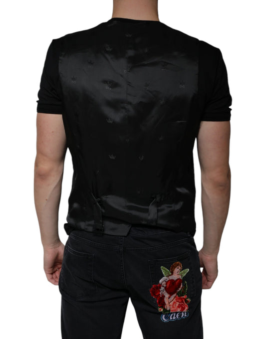 A black wool waistcoat with a floral embroidery on the back
