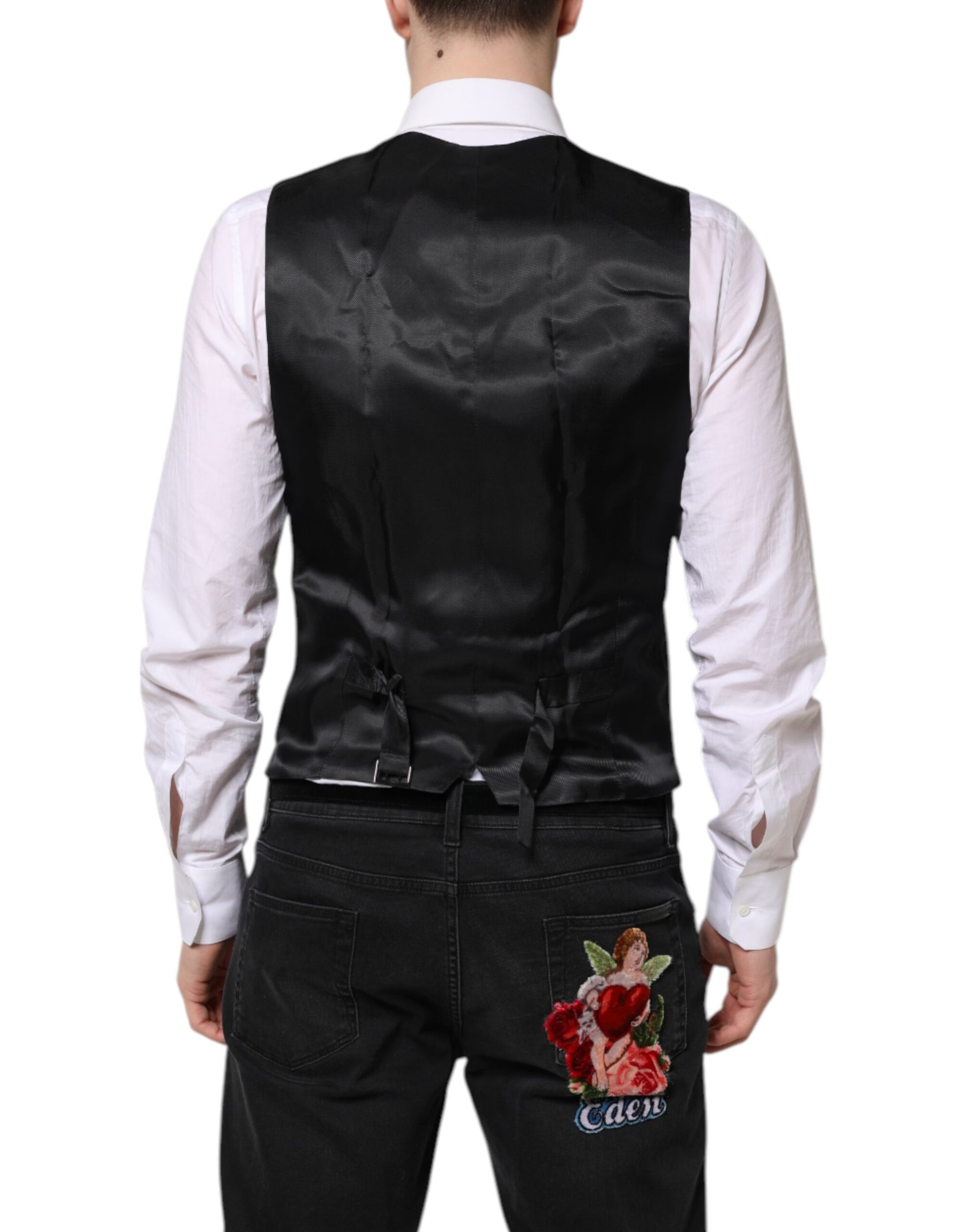 A black wool waistcoat with a rose embroidery on the back