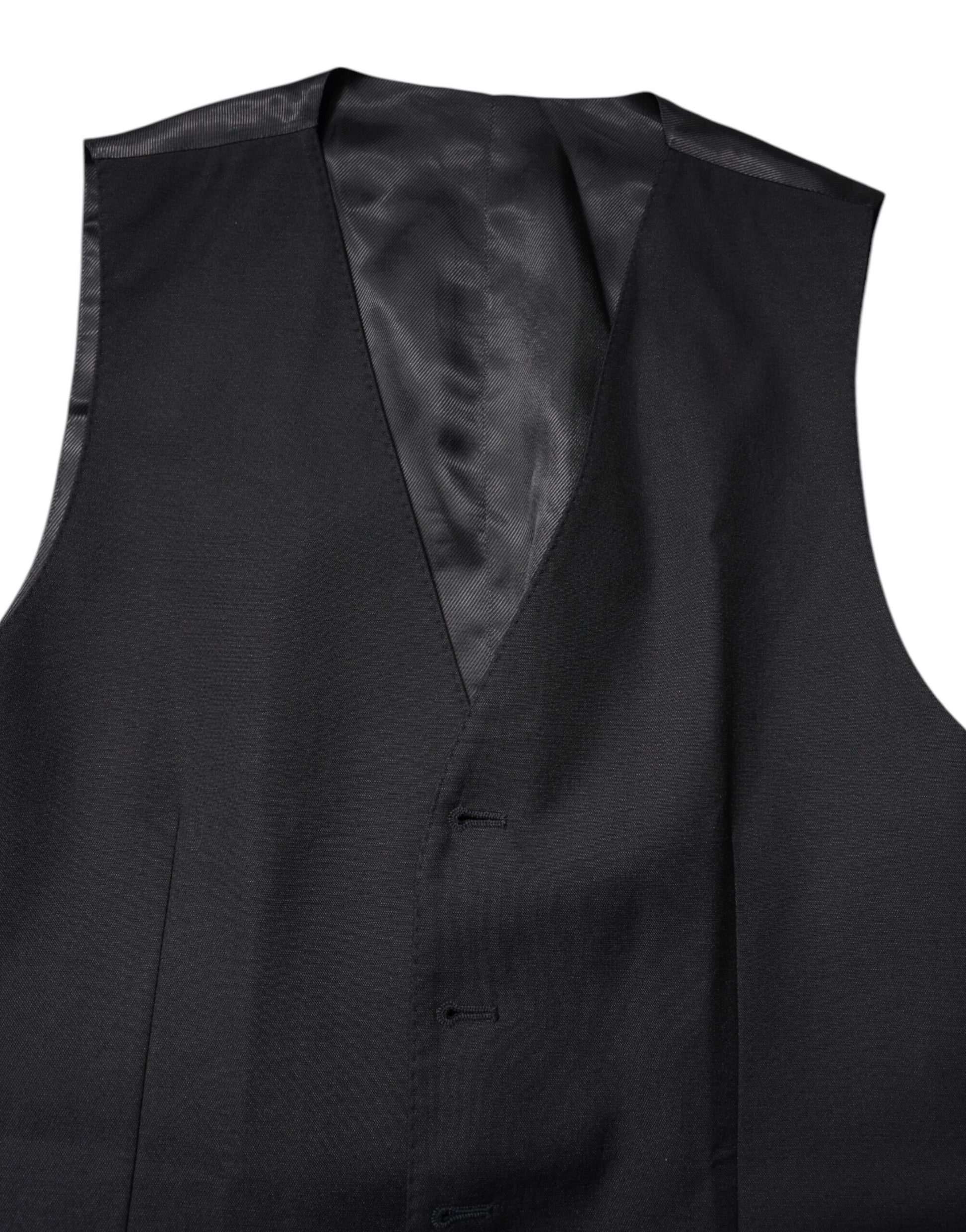 A black wool vest with a lapel and two pockets, part of formal wear