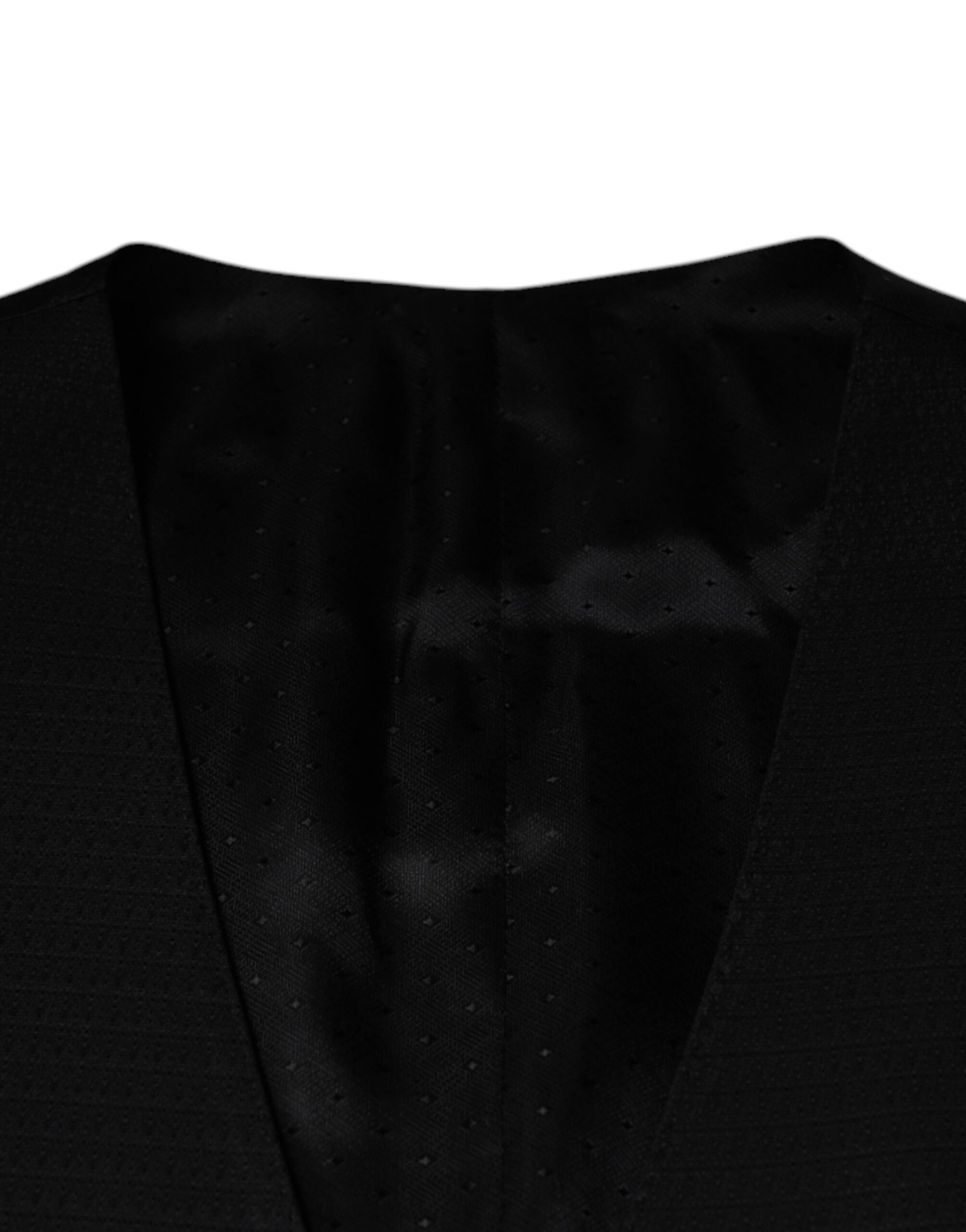 A black wool vest with a textured pattern and lapel collar
