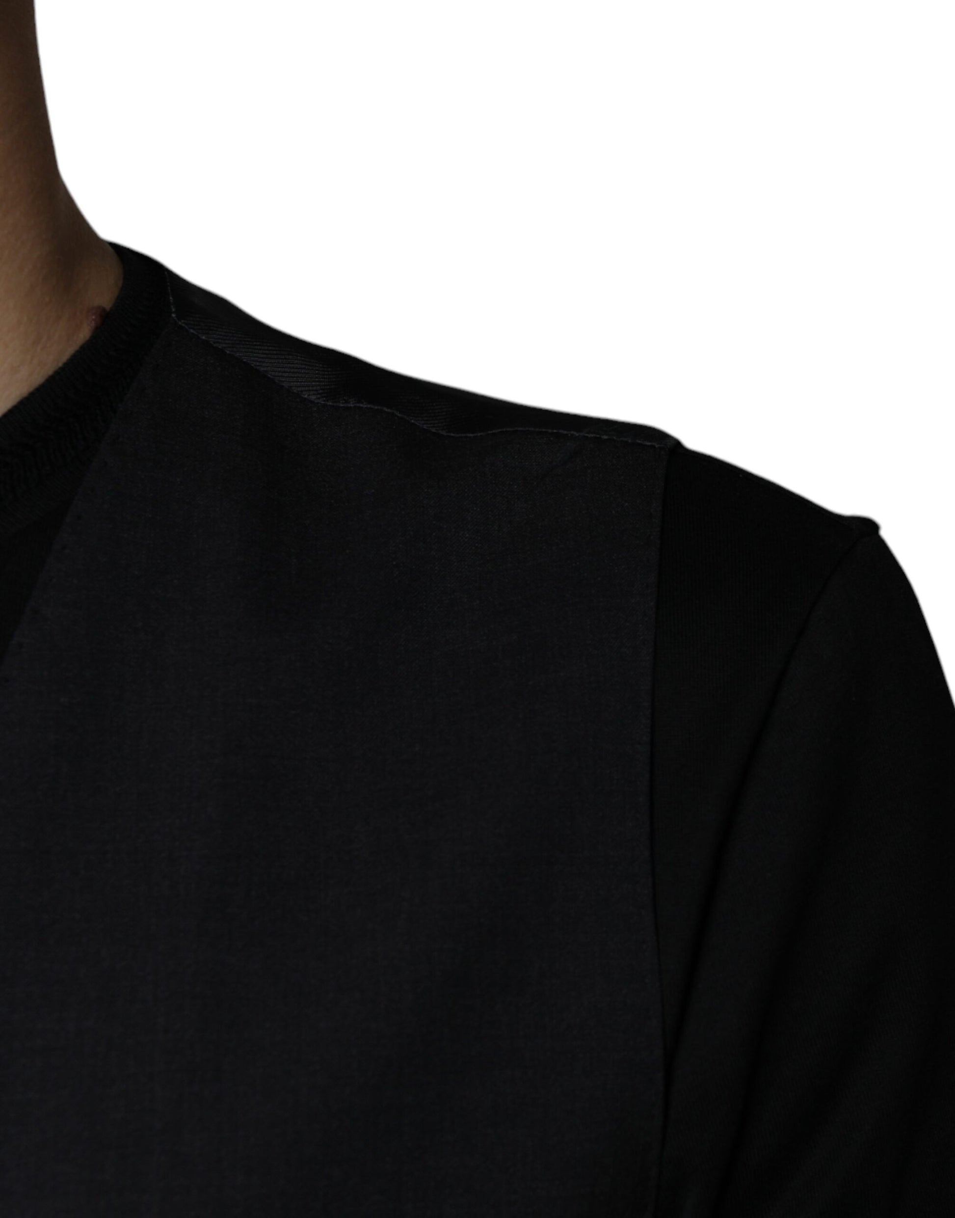 A black wool waistcoat with a formal design, part of the Dolce & Gabbana brand