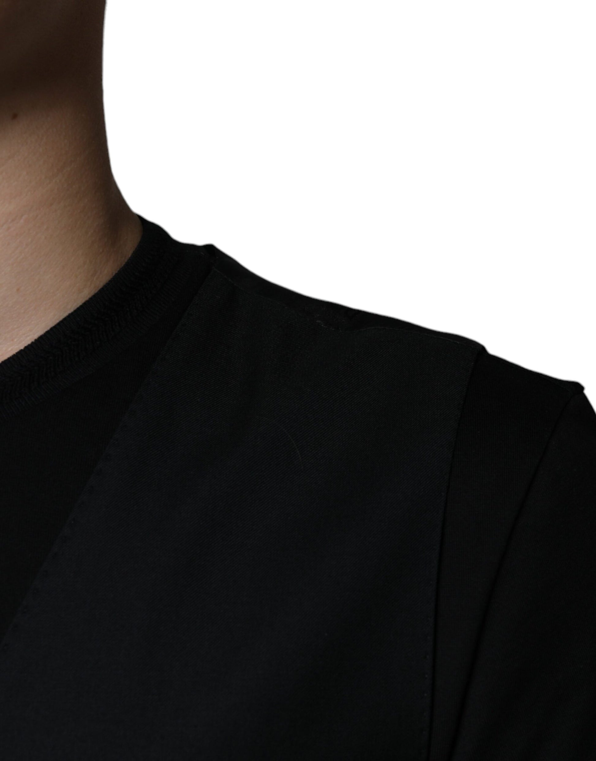 A black wool waistcoat with a textured pattern, part of a formal dress suit