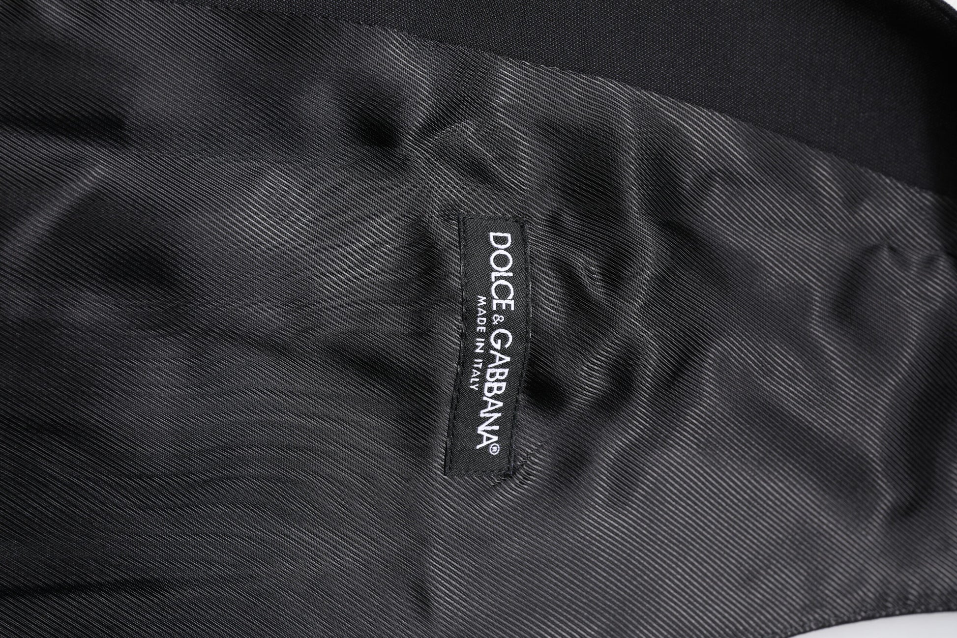 A black wool waistcoat with the Dolce & Gabbana logo