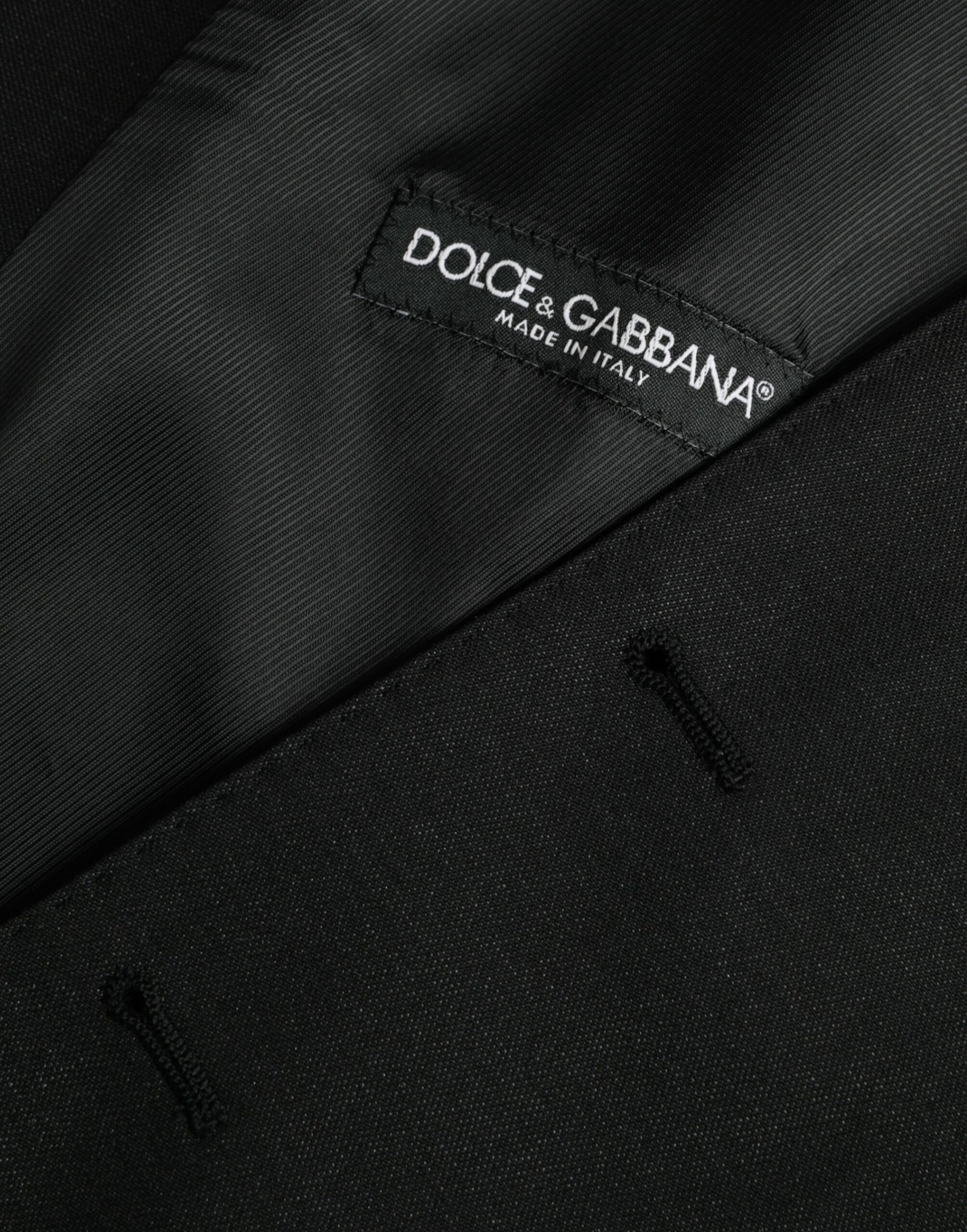 A black wool waistcoat with a label that reads "Dolce & Gabbana"