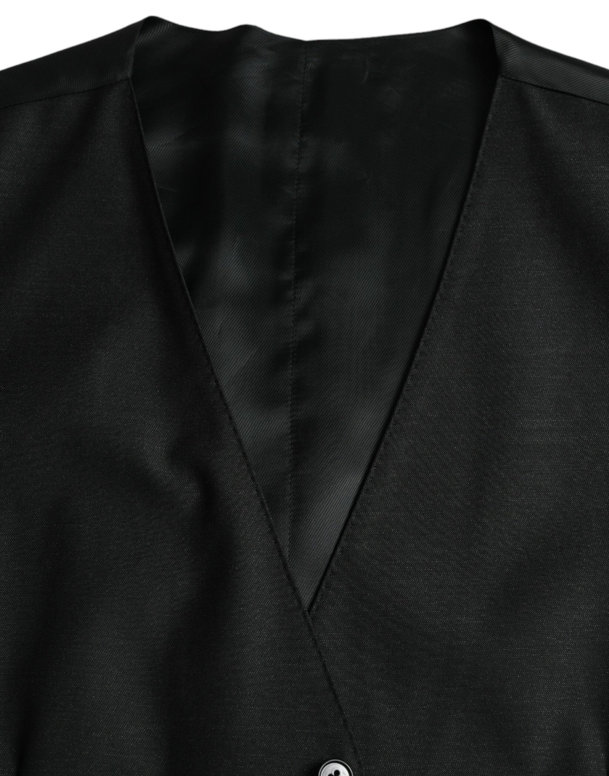 A black wool vest with a lapel and button closure