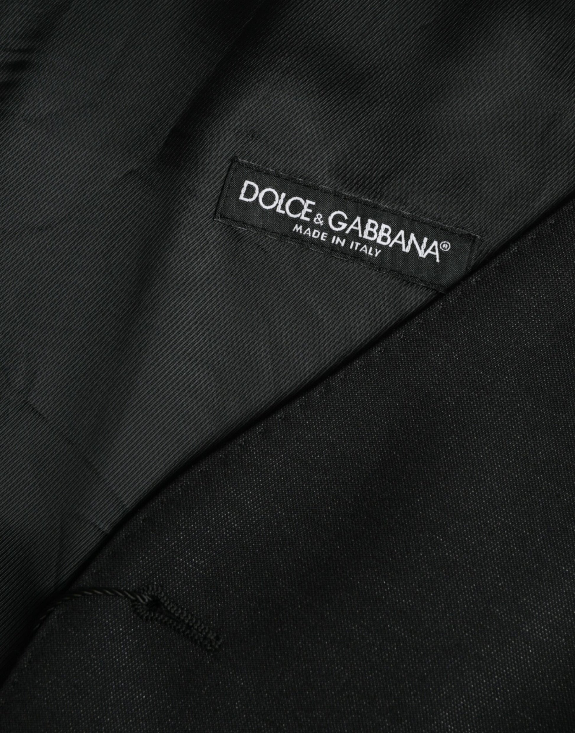 A black wool waistcoat with a label that reads "Dolce & Gabbana" on the left side