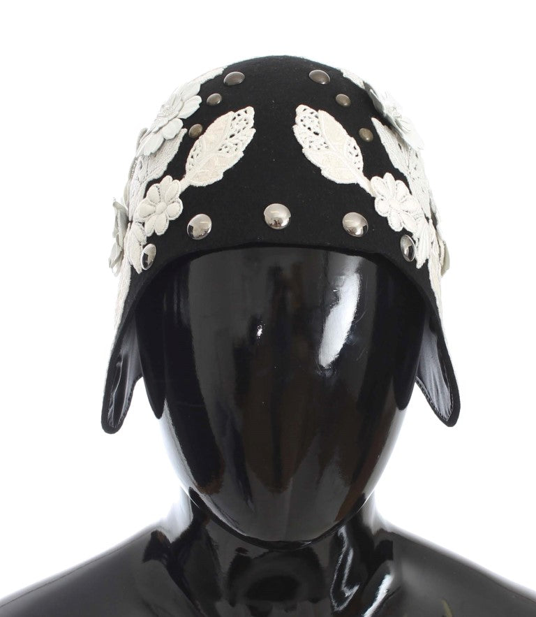Headgear with embroidered leaves on black background