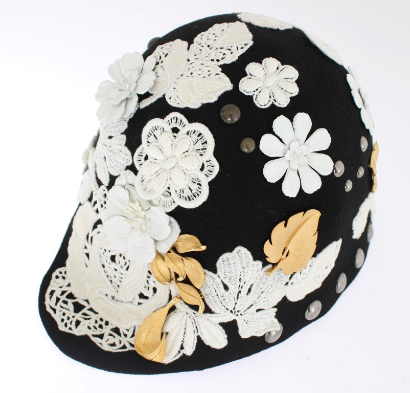 Decorative black hat with white flowers and gold accents