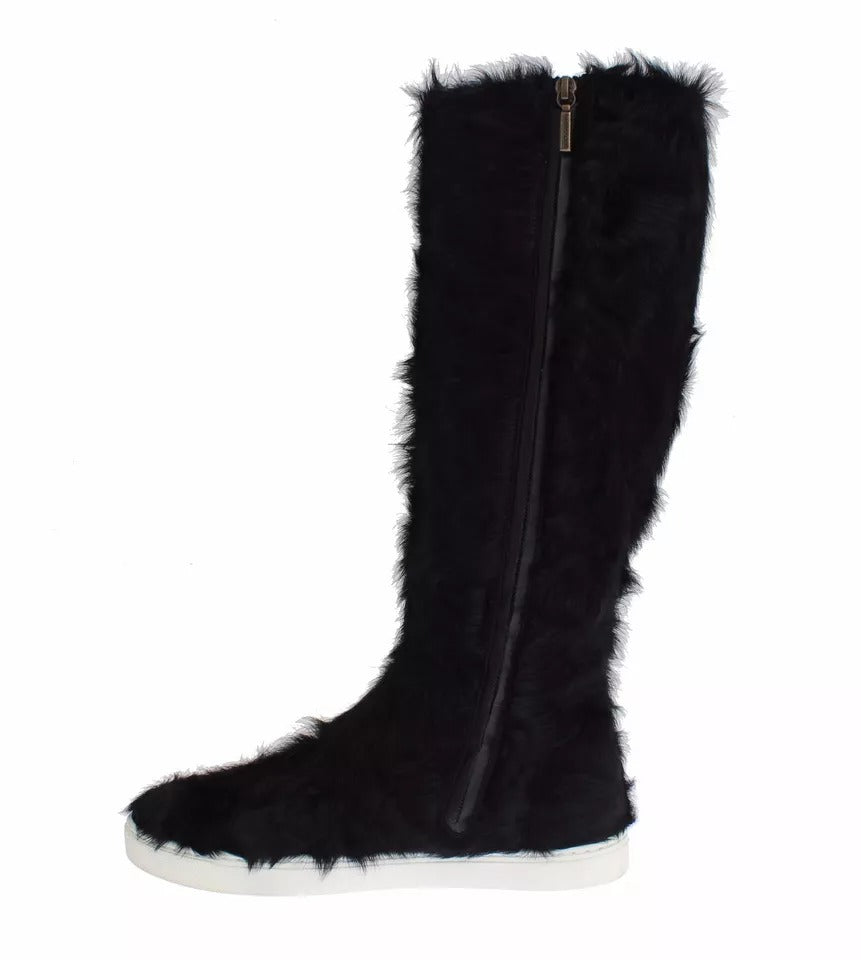 Furry black boot with white sole