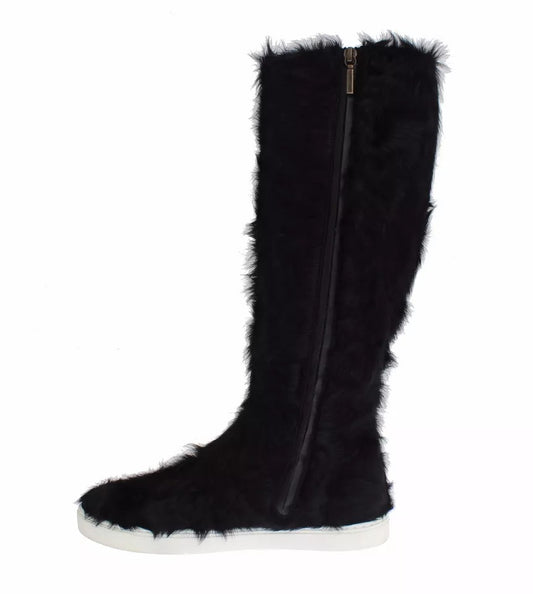 Furry black boot with white sole