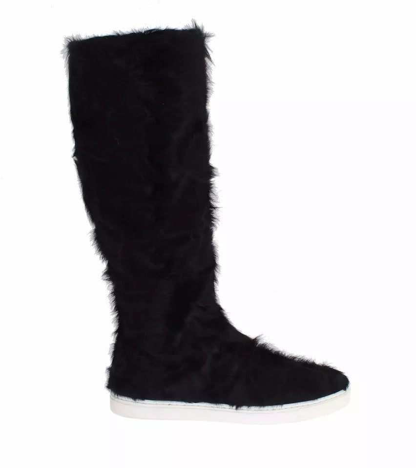 Furry black boot with white sole