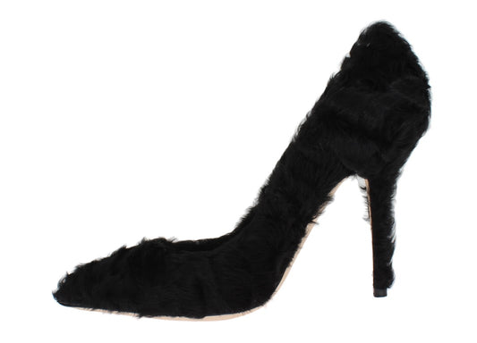 Black high heel shoe with fur trim and stiletto heel