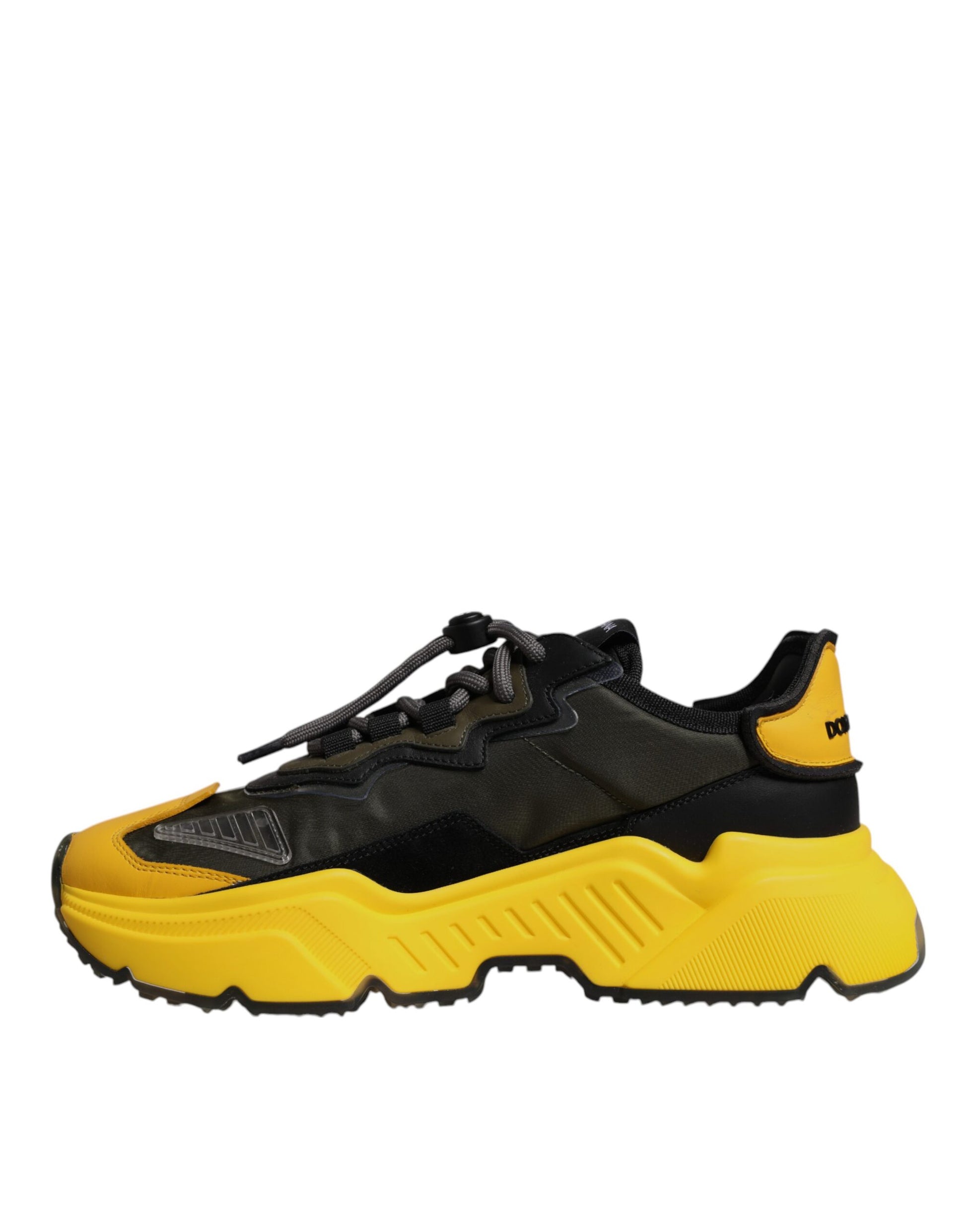 A pair of black and yellow sneakers with a low top, featuring the brand name "Dolce & Gabbana" on the side