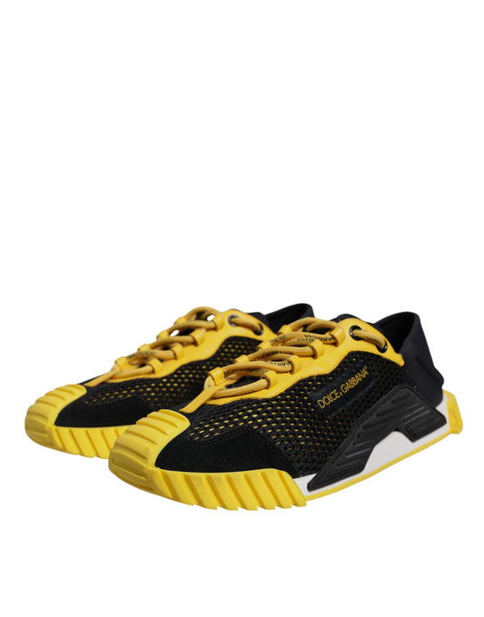 Yellow and black baby shoes with velcro straps