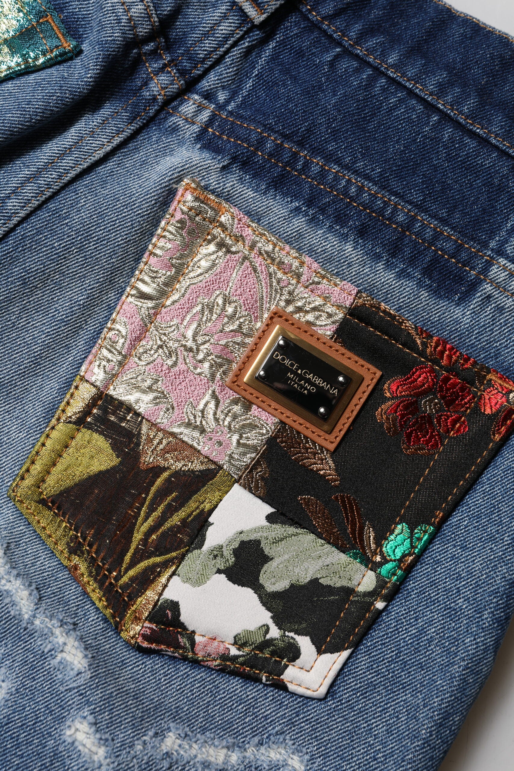 Pocket on denim jeans with floral pattern