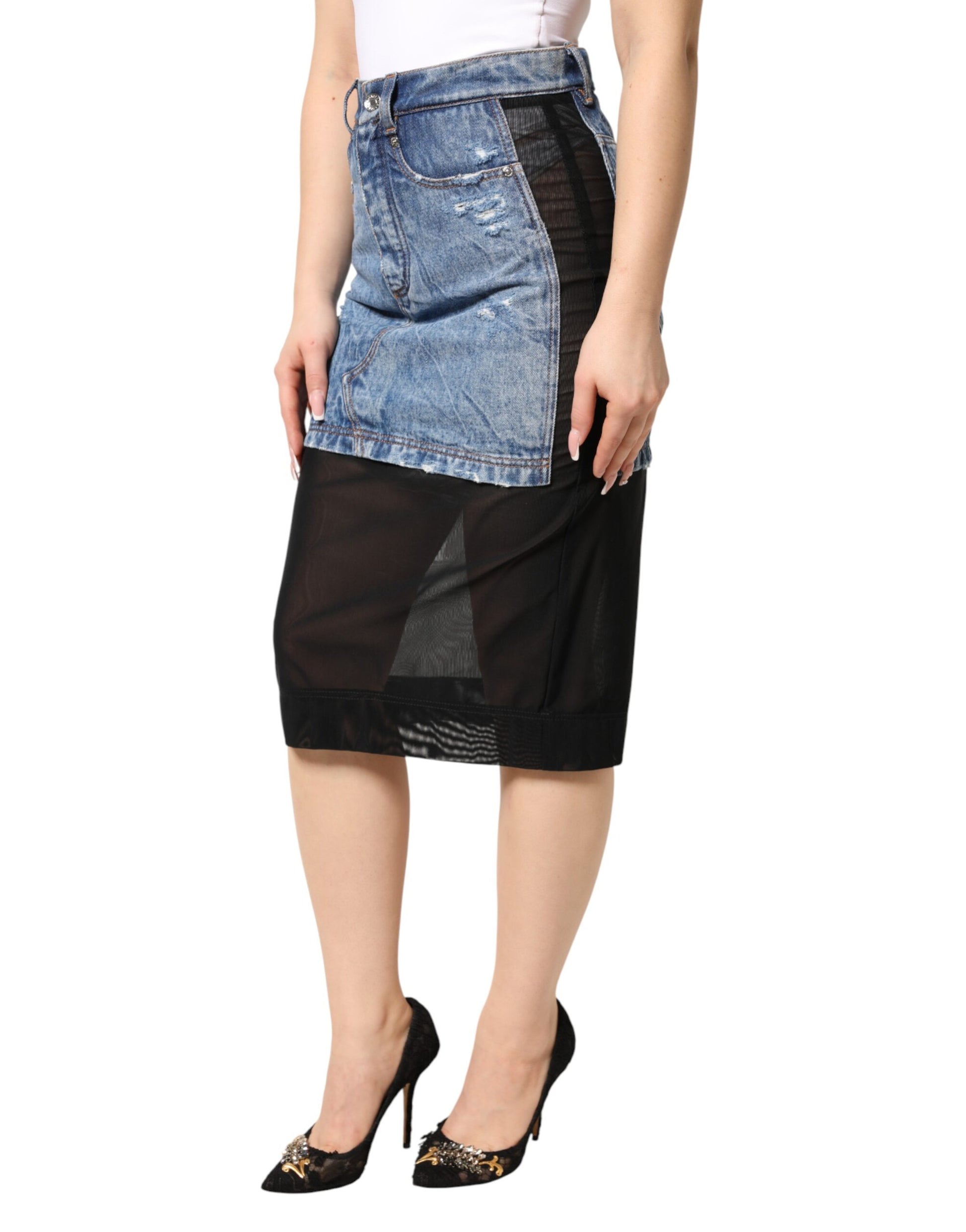 Woman wearing denim skirt and black heels