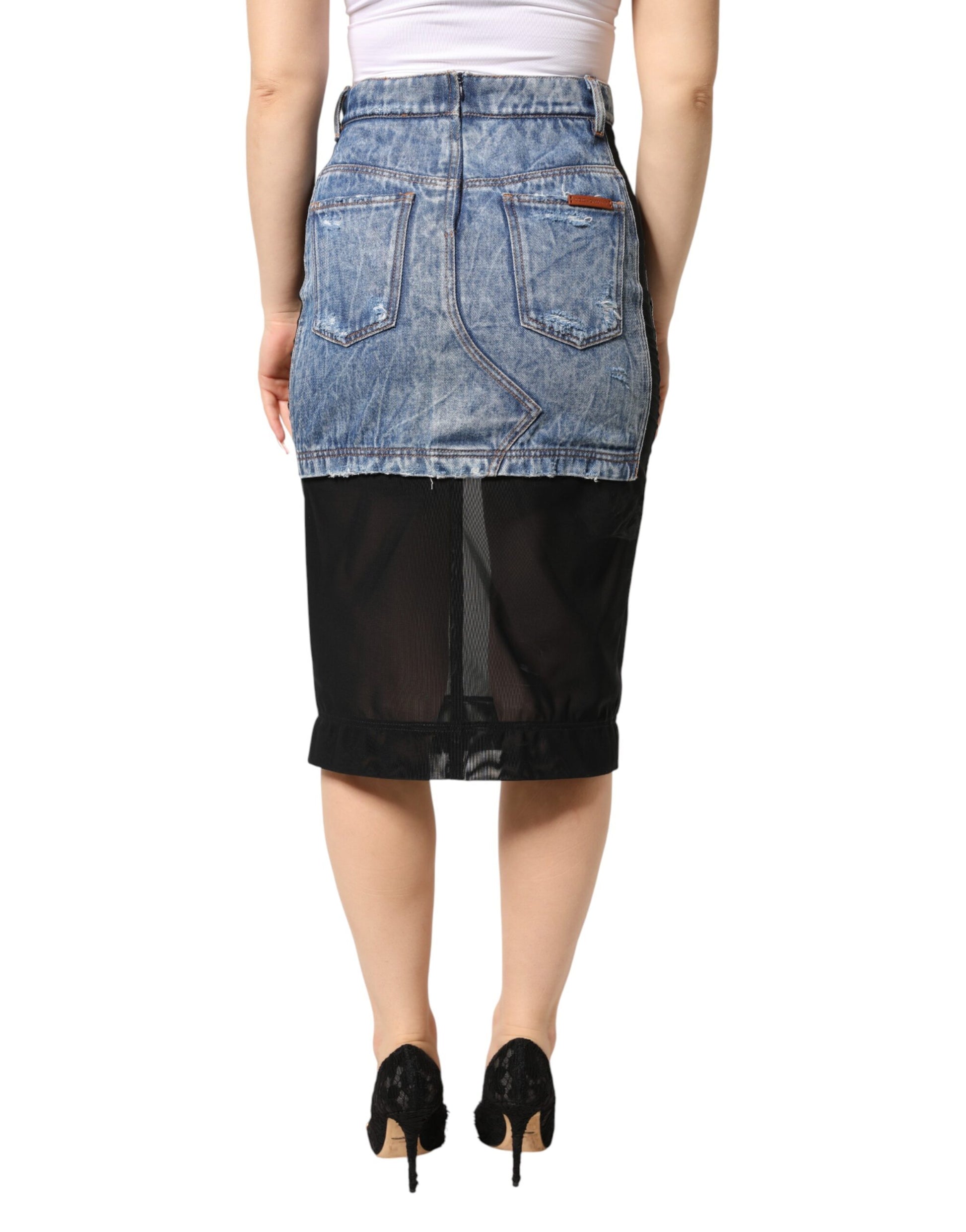 Woman wearing denim skirt and black heels