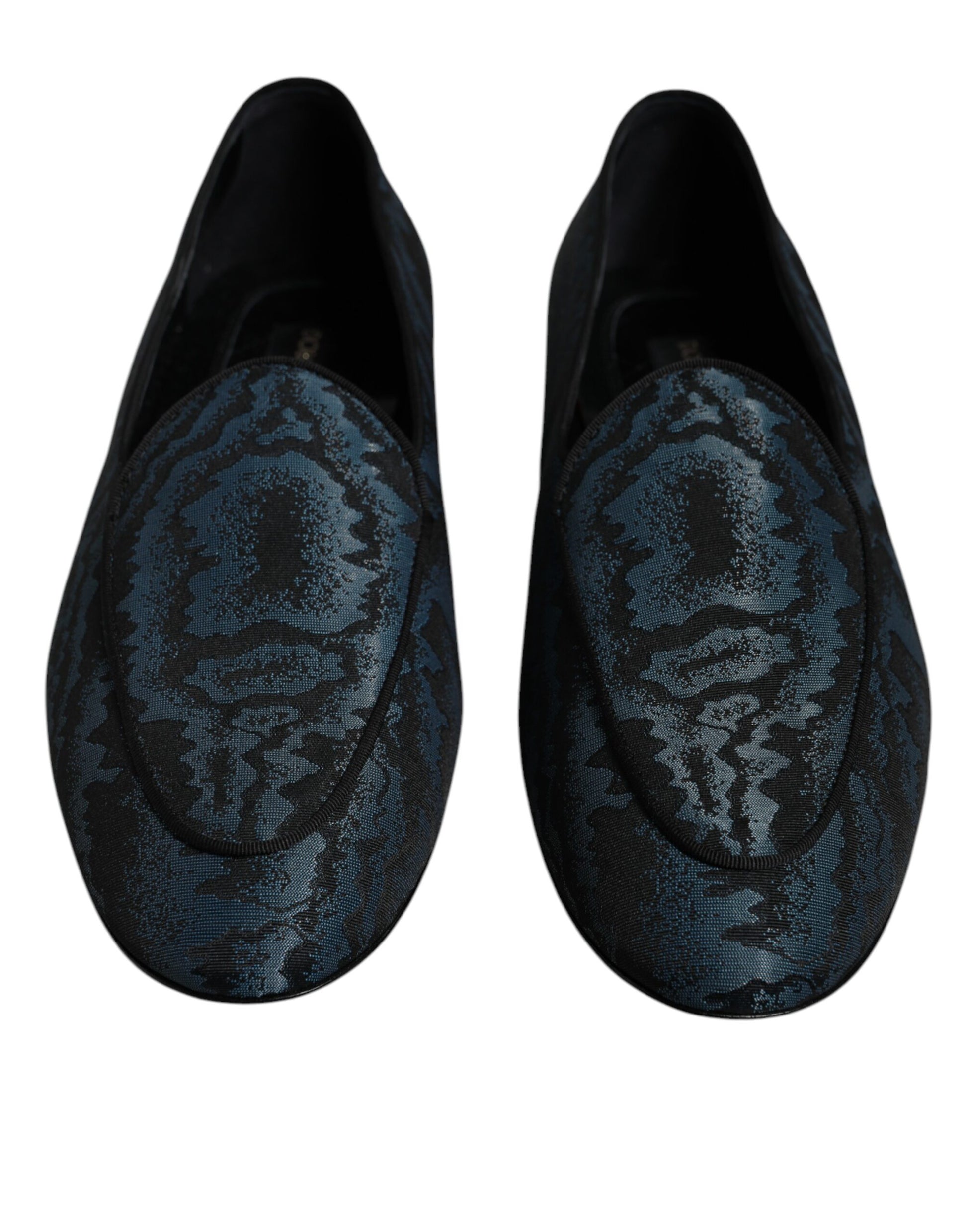 Pair of blue loafers with snake skin print