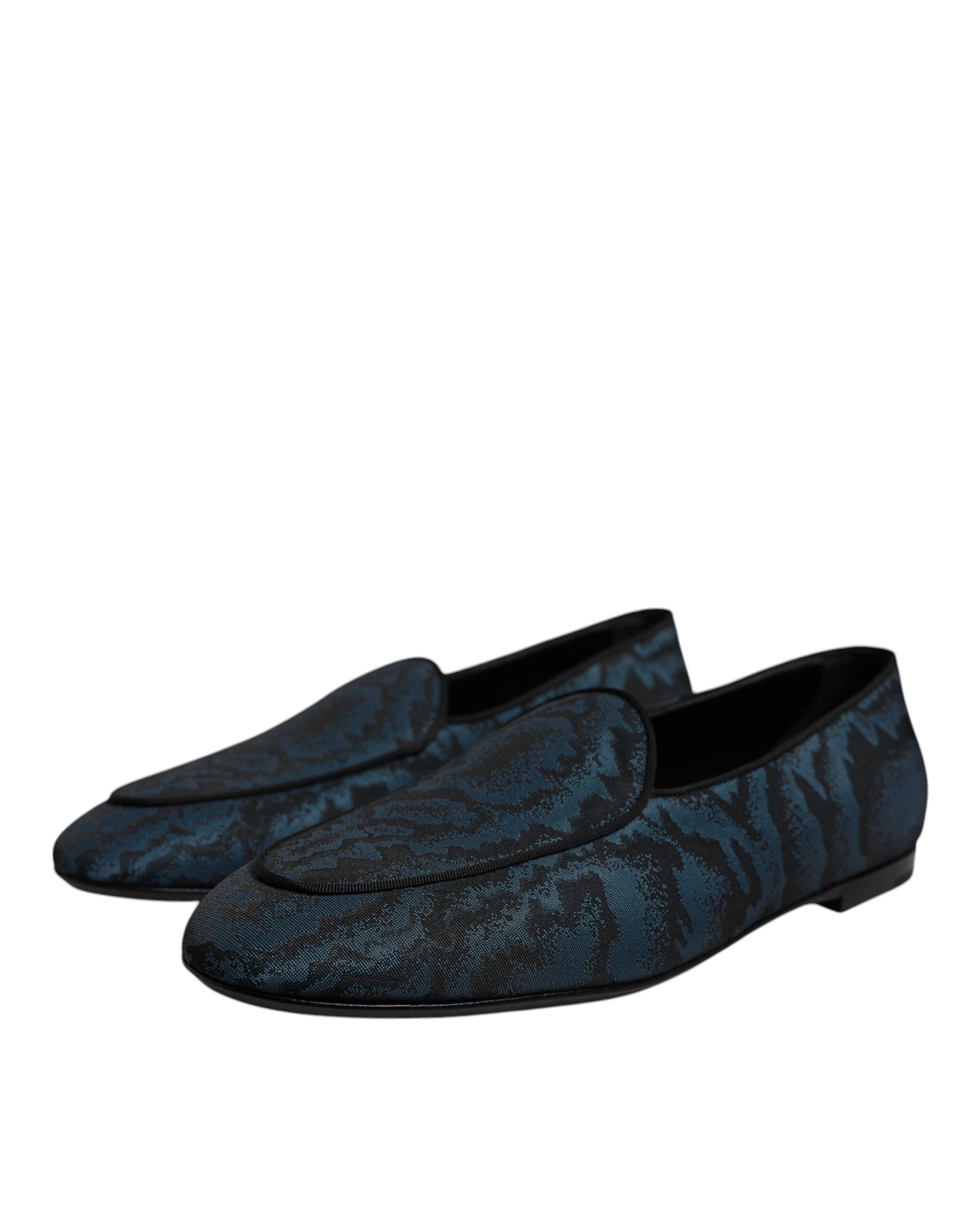 Pair of blue velvet loafers with embossed pattern