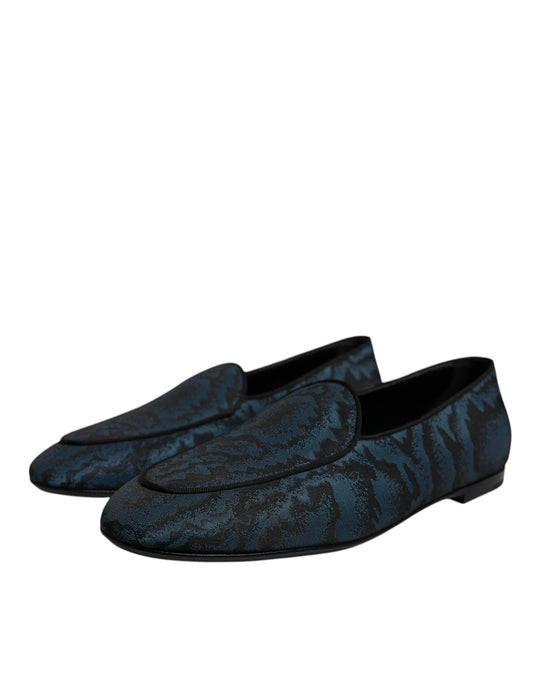 Pair of blue velvet loafers with embossed pattern