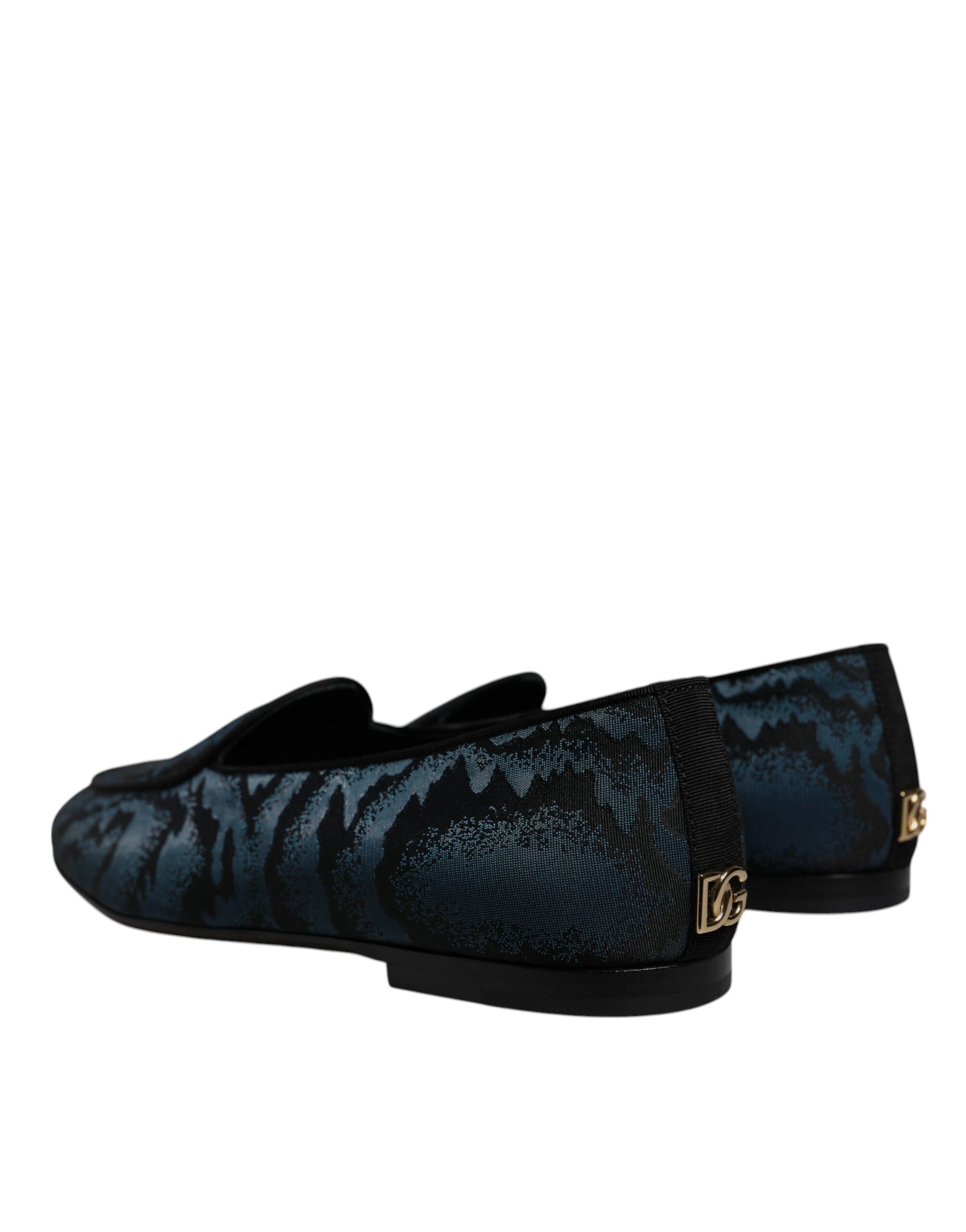 Blue velvet loafer shoes with gold accents