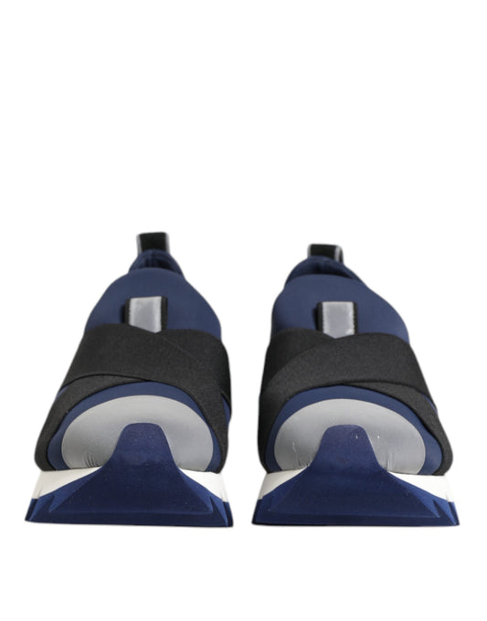 Pair of blue black slip on shoes with velvet trim and silver buckle