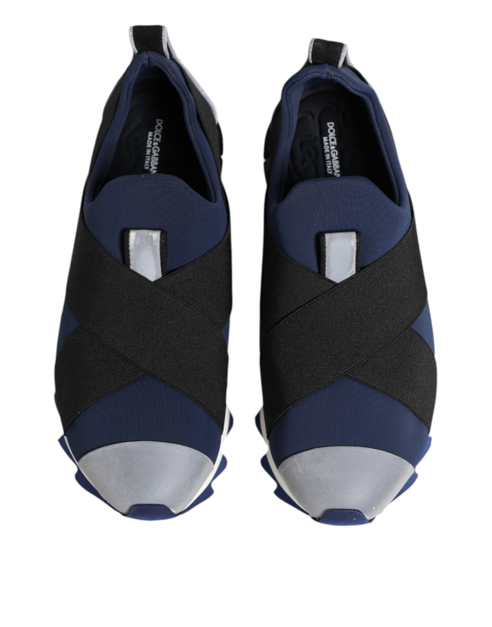 Pair of blue black slip on low top men's shoes with white soles