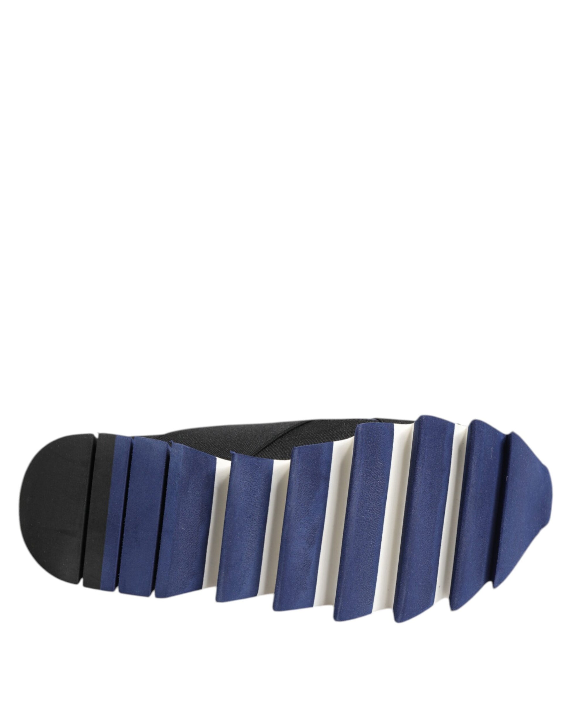 A pair of blue black slip on low top men's shoes with a strap design