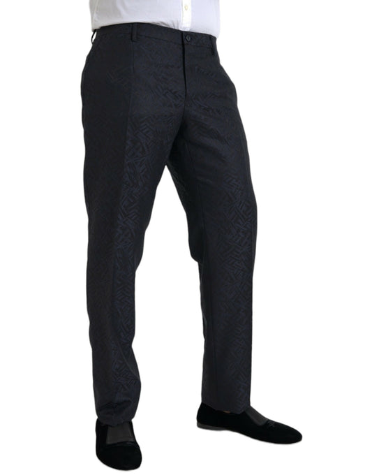 A pair of men's dress pants with a blue brocade wool pattern. They are skinny fit and feature a distinctive d
