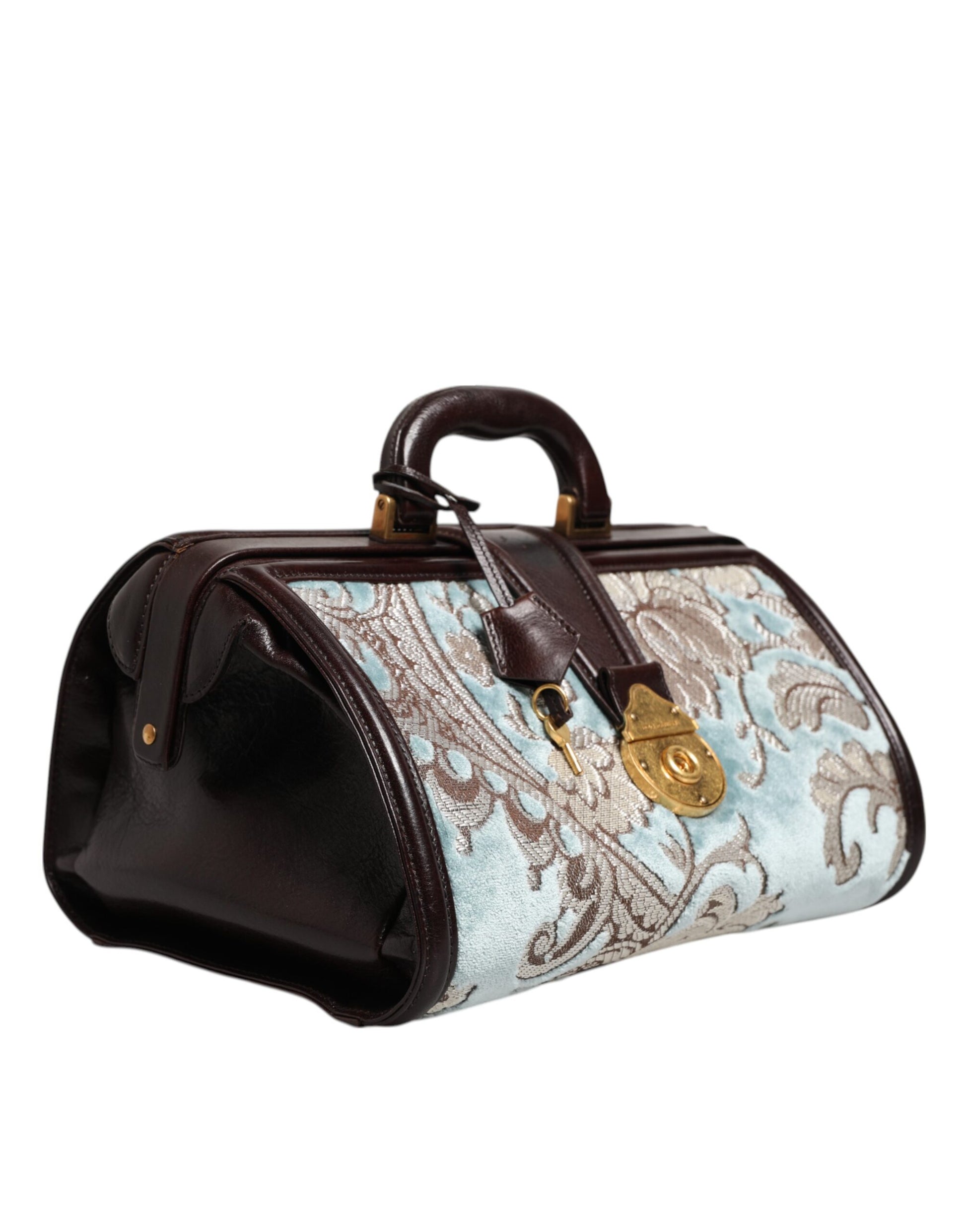 Blue and brown suitcase with gold accents