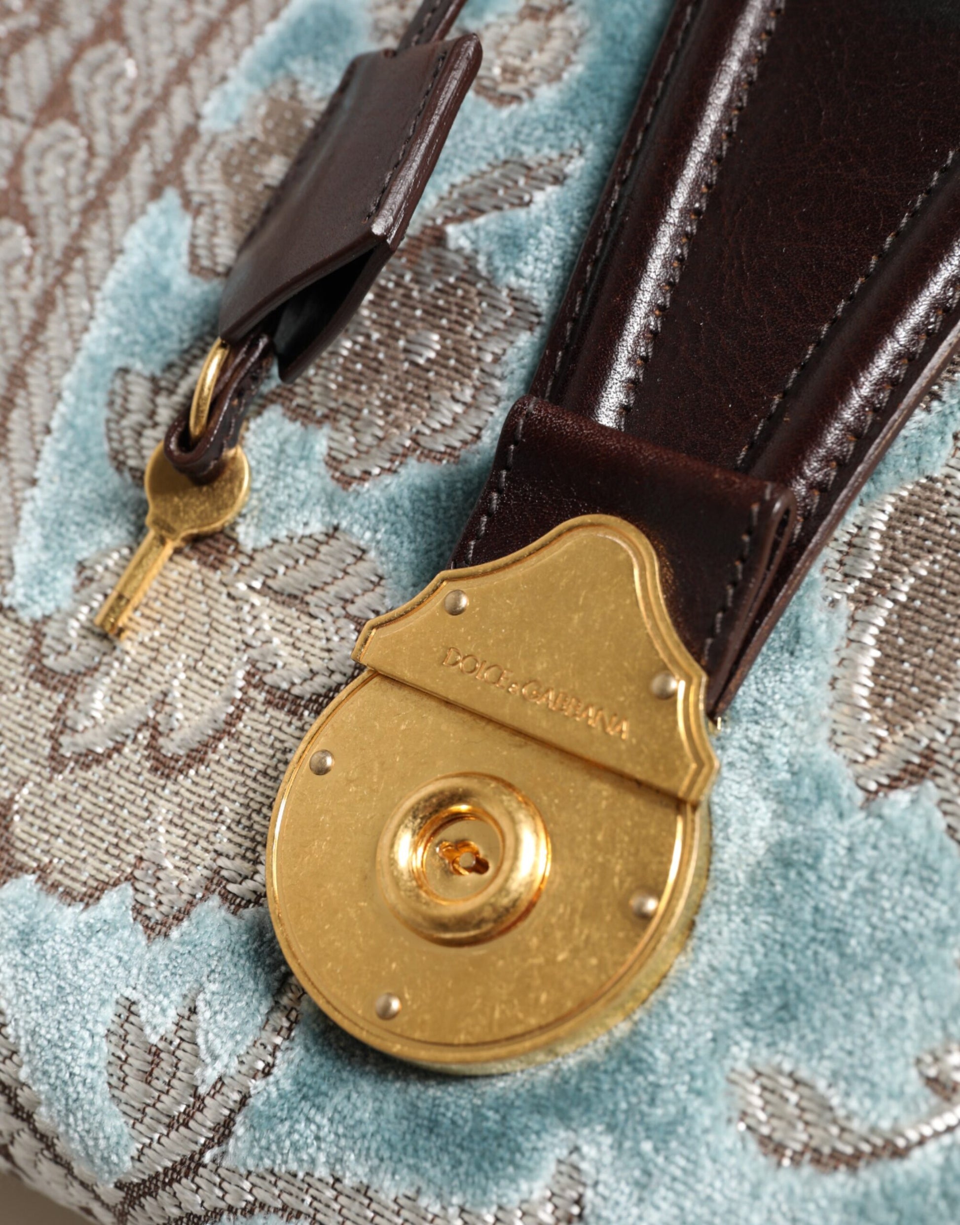 Brown leather belt with gold buckle