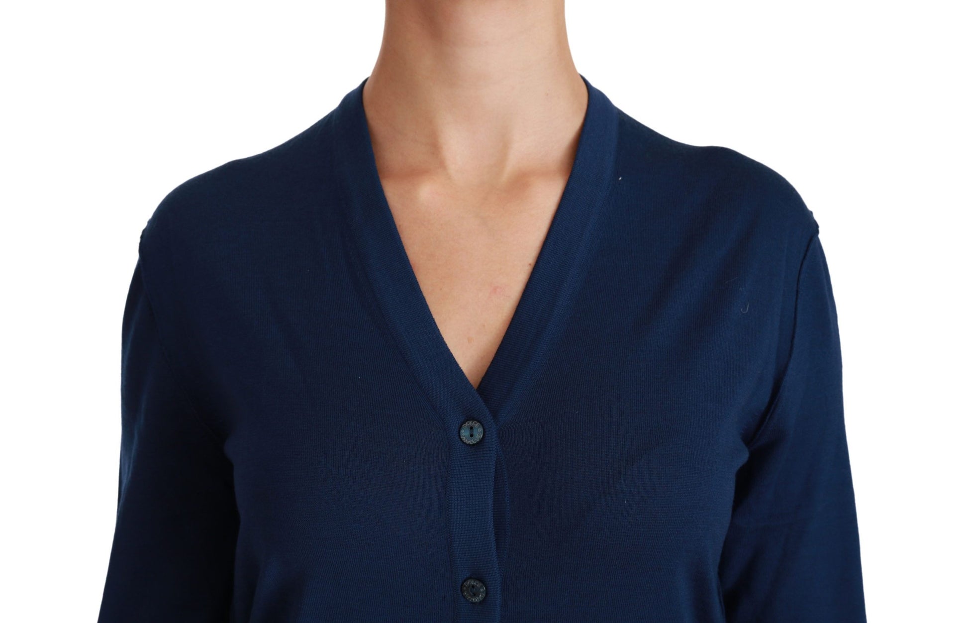 Blue cardigan with collar on woman's neck