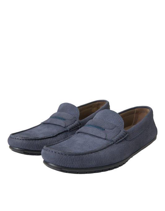 Pair of blue loafers with a bow on top