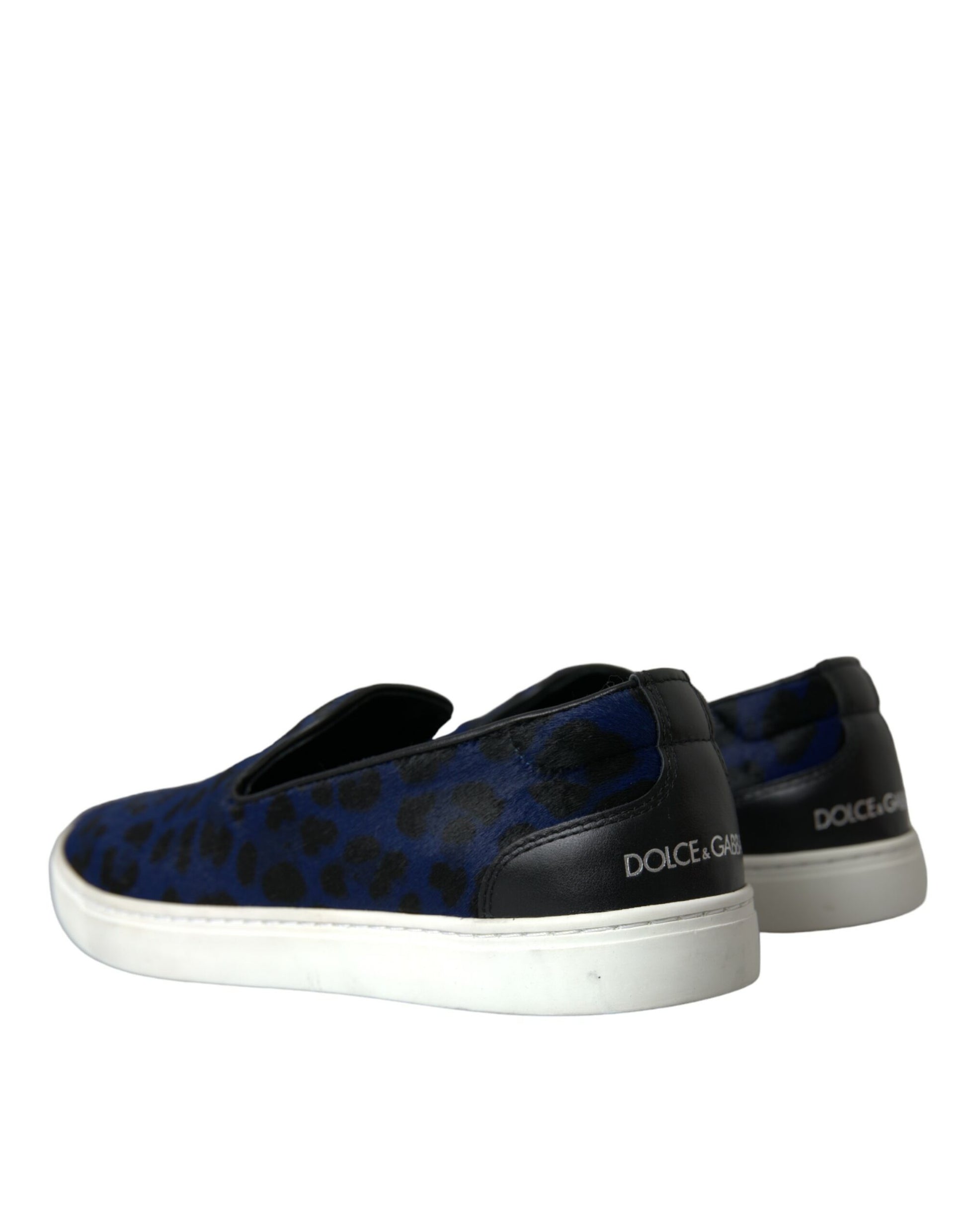 Pair of sneakers with a blue and black patterned upper