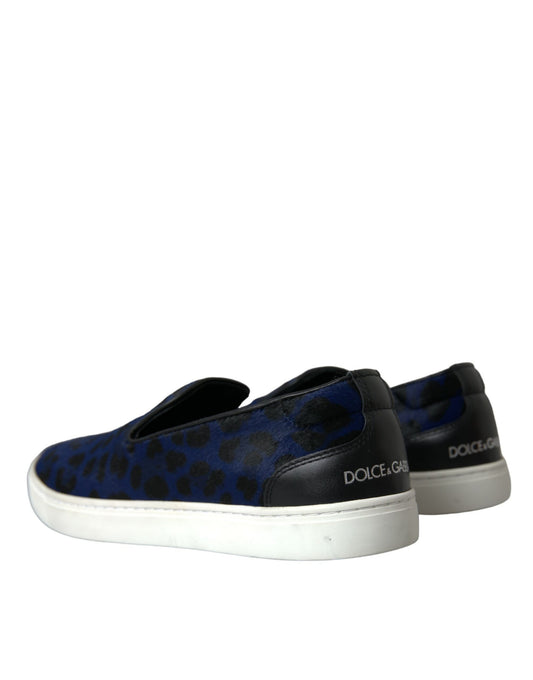Pair of sneakers with a blue and black patterned upper