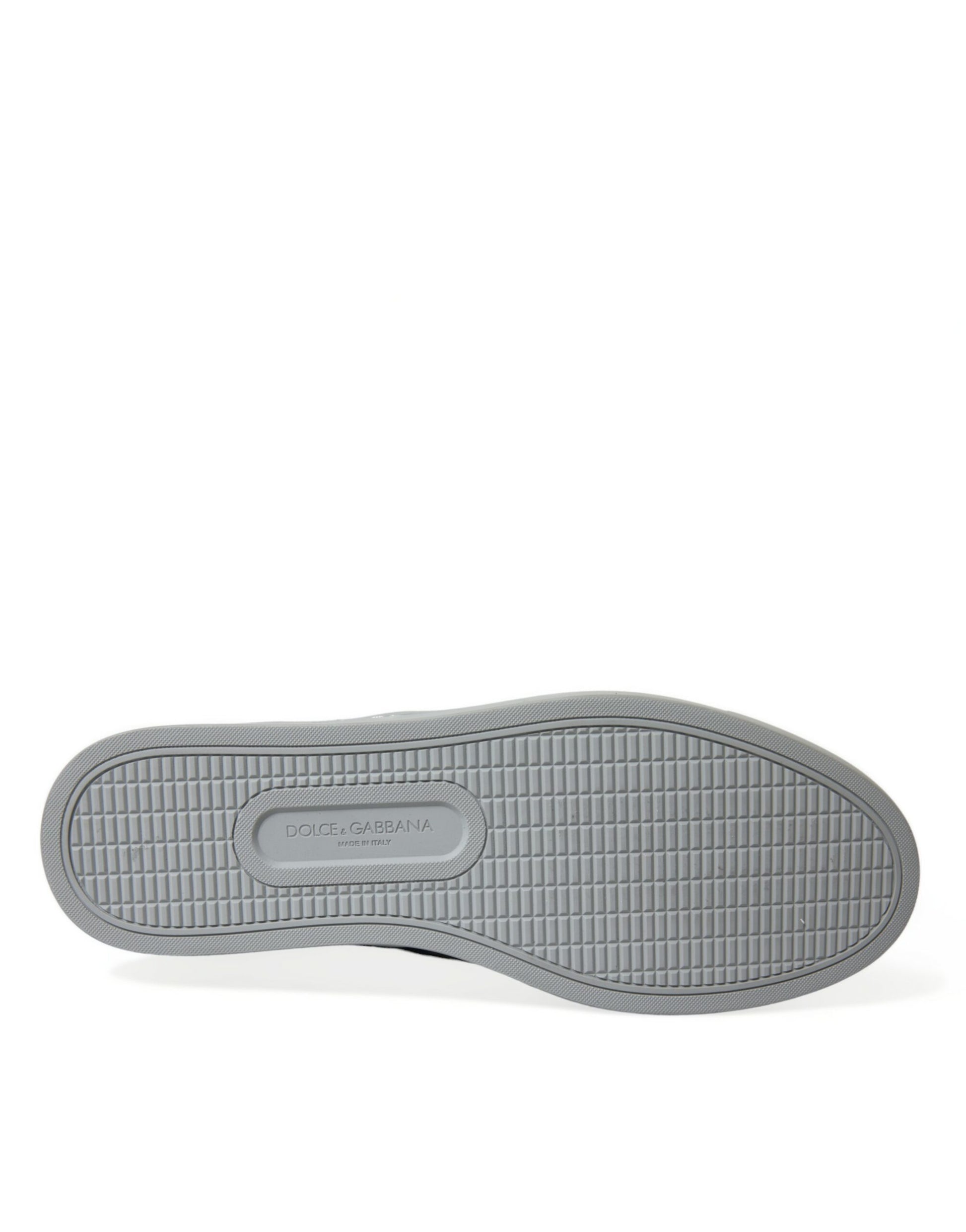 A single shoe against a white background with a gray stripe pattern. The shoe appears to be a sneaker or casual footwear