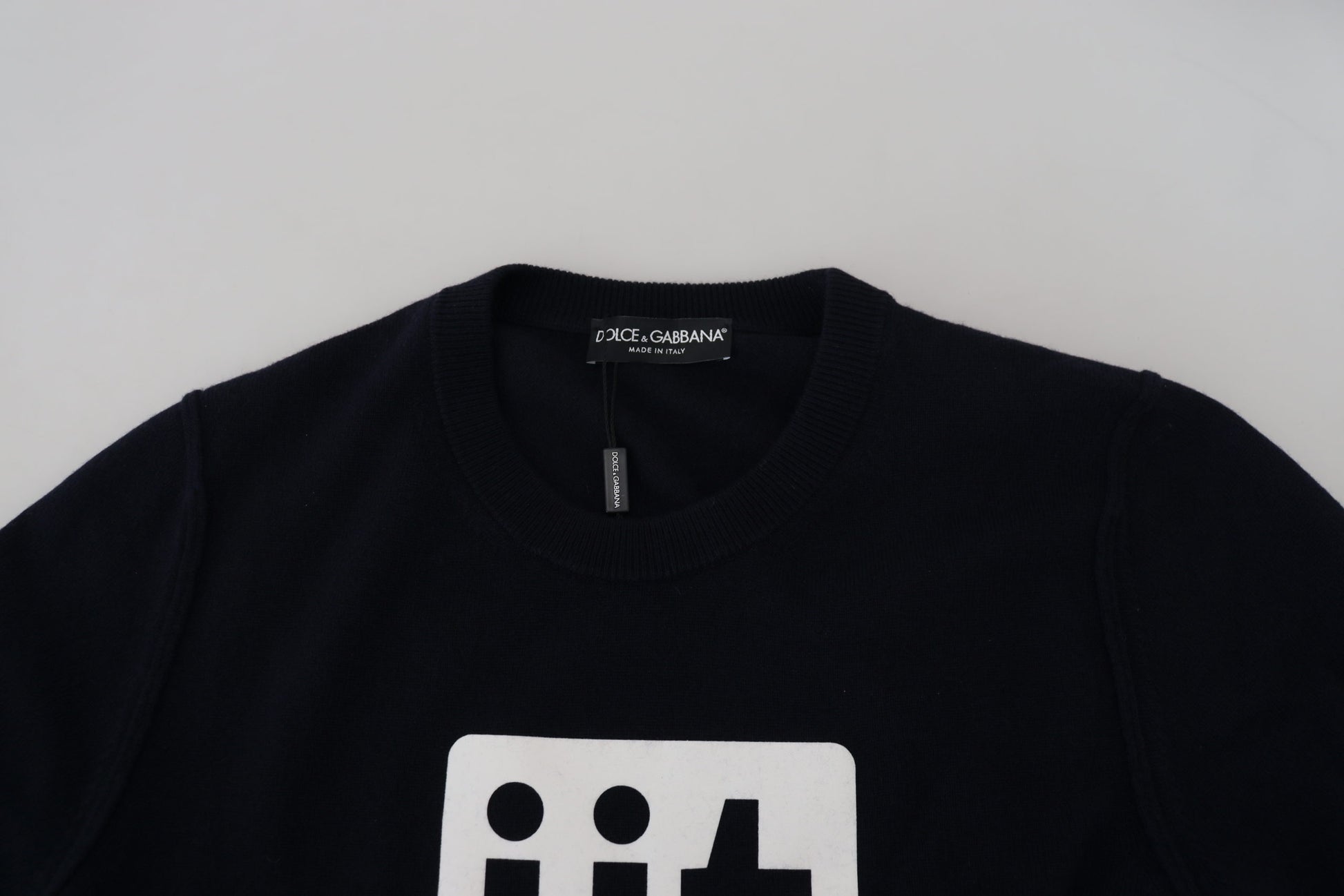 Black sweater on hanger